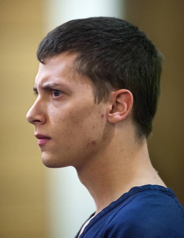 Colin Lowrey furrows his brow while reacting to the defense's argument for a higher bail being set in Henderson Justice Court on Wednesday, Nov. 6, 2013.